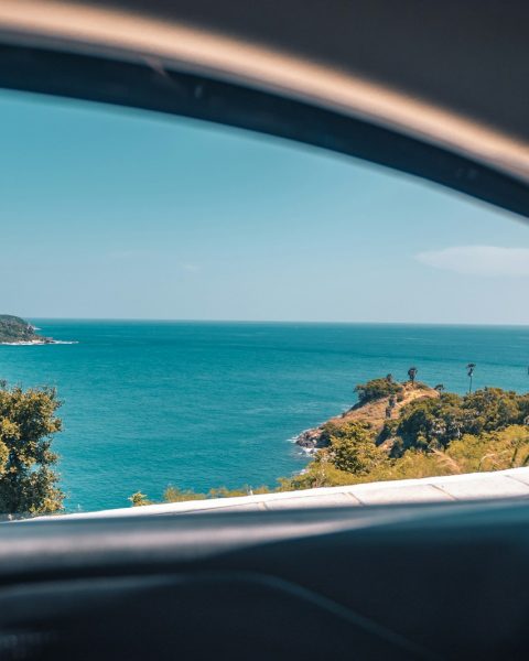 coastal view through vehicle window