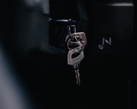 silver key on black car