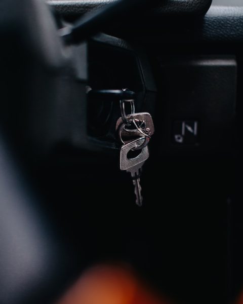 silver key on black car